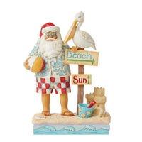 Jim Shore Heartwood Creek Coastal Christmas - Santa with Signs and Pelican